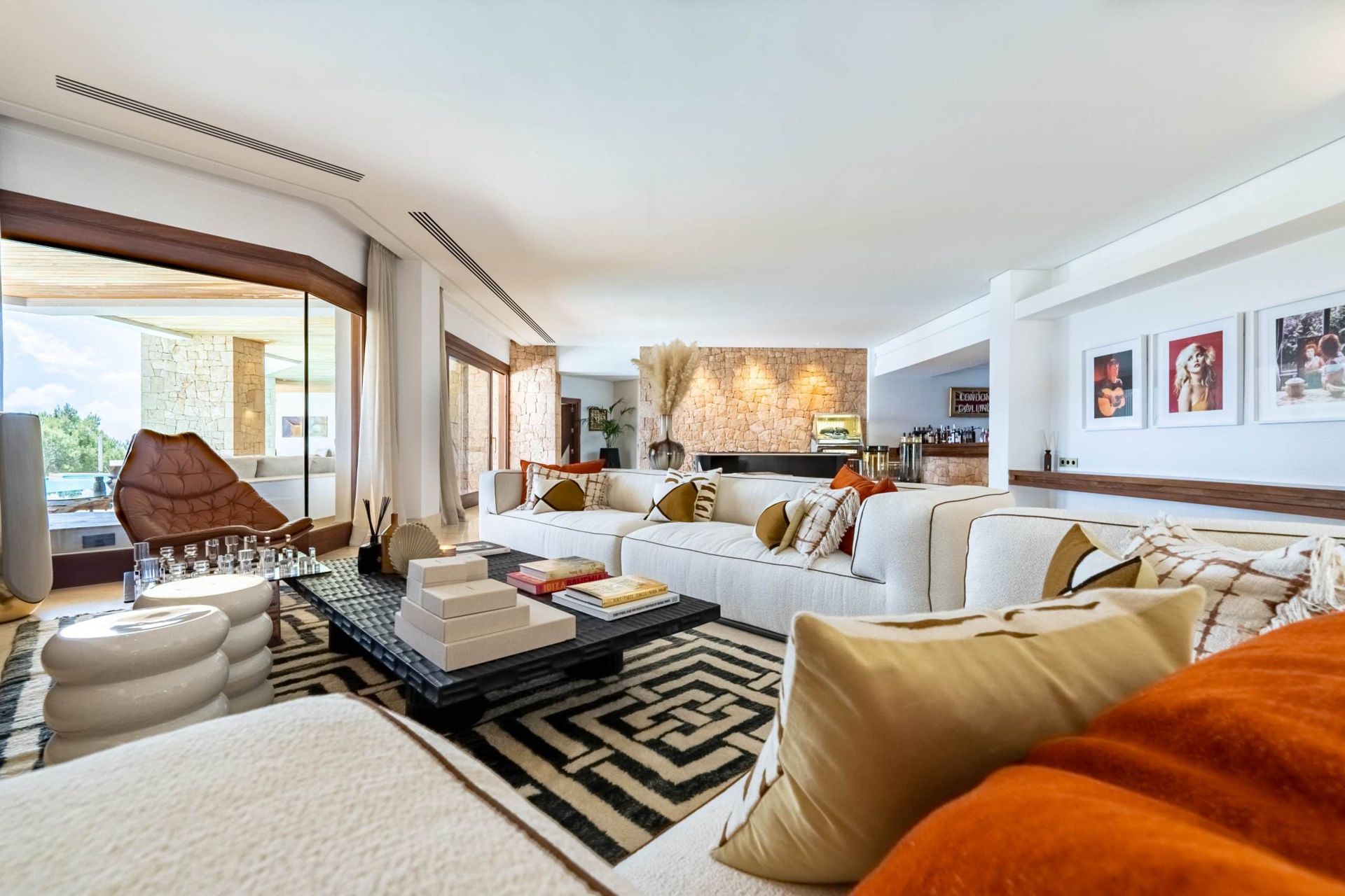 Ibiza villa living room with integrated lighting and stone feature wall